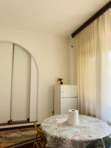 a kitchen with a table and a refrigerator at Venice Villa House in Mestre +58 photos