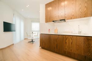 a kitchen with a sink and a counter at Rajna Apartments in Ulcinj