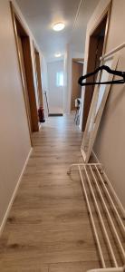 an empty hallway with a staircase in a building at Cottage in the middle of nowhere 2 in Ölfus