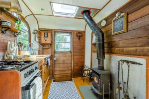 a kitchen with a stove and a stove at 1 Bed in Elsing oc-d44229 in Elsing