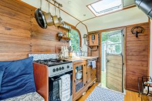 a kitchen with a stove and a sink at 1 Bed in Elsing oc-d44229 in Elsing