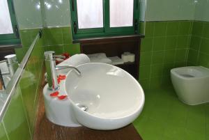 Ett badrum på Hotel Stefano a Melito