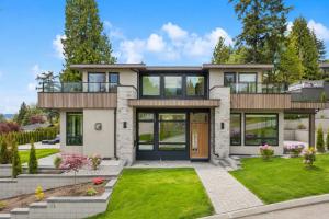 a bedroom house with a large front yard at North Shore Luxe Villa in North Vancouver