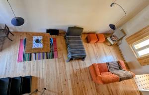 an overhead view of a living room with furniture at Manas Slowliving - Santiago in Santiago do Cacém +10 photos