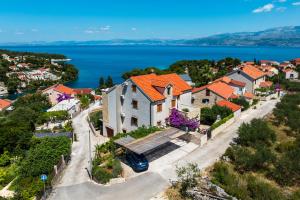 an aerial view of a town with a lake at Villa Užanca in Splitska