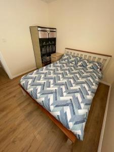a bedroom with a large bed in a room at Modern Town Centre 3 Bed Apartment in Sligo