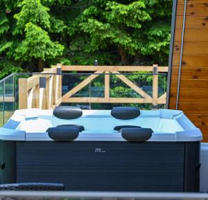 a ping pong table with four chairs on top of it at Tara mountain house Kopaonik in Kopaonik