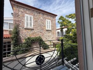 a view of a building from a balcony at Gule Cunda in Ayvalık