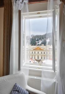 Nespecifikovaný výhled na hory nebo výhled na hory při pohledu z aparthotelu