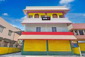 a building with a oops sign on top of it at Hotel O New Star Guest House in Behāla