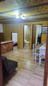 a living room with a couch and a bed in a room at Natural country house in Guarne +3 photos