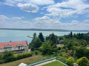 a view of the lake from a house at T8 Sunset Tihany 19 in Tihany