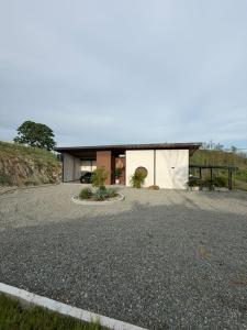 a house on the side of a road at CASALIA Sopetran in Sopetrán