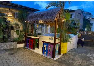 a building with a play center with plants in it at Retreat Cameroon BASTOS in Yaoundé