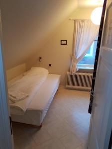 Postel nebo postele na pokoji v ubytování Budget Guesthouse Borgustova