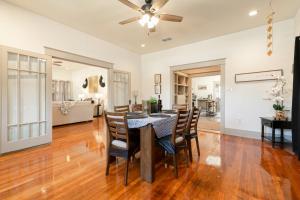 a dining room and living room with a table and chairs at Uptown Merchant in Abilene