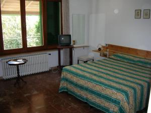 Krevet ili kreveti u jedinici u objektu B&B La Principessa