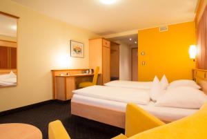 Postel nebo postele na pokoji v ubytování Hotel Rio