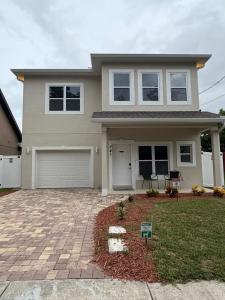 a house with a brick driveway in front of it at Room in Downtown Orlando! Close to everything! in Orlando
