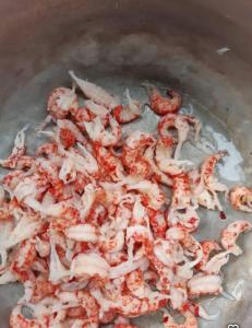 a bunch of shrimp cooking in a pan at Paradise Resort in Chabahinga +91 photos