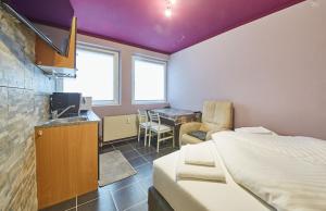 Posteľ alebo postele v izbe v ubytovaní Appartement Snowflake