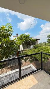 a view from the balcony of a house at Villa Alibaba D3 in Batu