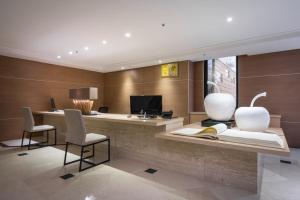 Televisyen dan/atau pusat hiburan di Wemeet Hotel +37 gambar