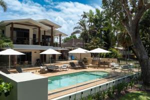 an image of a house with a swimming pool at Latitude 17 Suite 2 in South Mission Beach