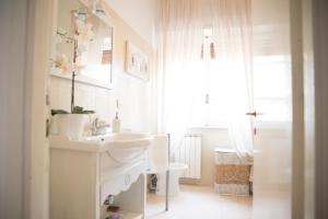 Koupelna v ubytování Tisserand Boutique & Apartment + 40 fotografií
