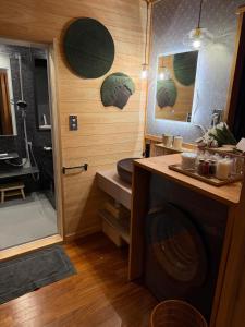 a bathroom with a toilet and a sink and a shower at 森権太 Forest Gonta in Takamori +96 photos