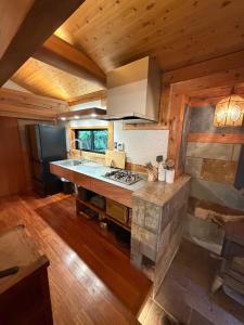 an overhead view of a kitchen in a cabin at 森権太 Forest Gonta in Takamori