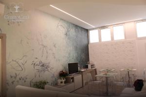 TV a/nebo společenská místnost v ubytování Centro Città Luxury B&B