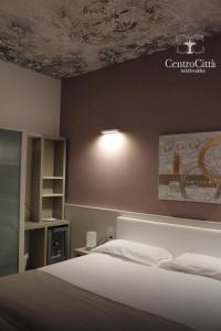 Postel nebo postele na pokoji v ubytování Centro Città Luxury B&B
