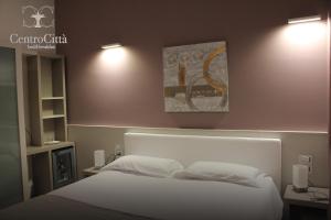 Postel nebo postele na pokoji v ubytování Centro Città Luxury B&B