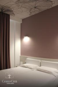 Postel nebo postele na pokoji v ubytování Centro Città Luxury B&B