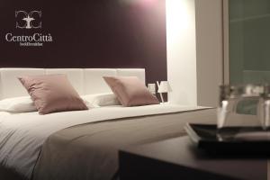 Postel nebo postele na pokoji v ubytování Centro Città Luxury B&B