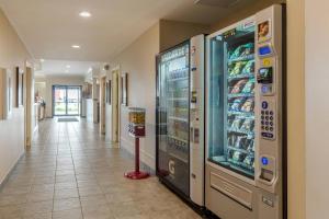 a large refrigerator in a hallway of a store at Amsterdam Inn & Suites, an Ascend Collection Hotel in Fredericton