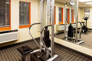 a gym with treadmills and elliptical machines at Quality Inn Plainfield I-395 in Plainfield