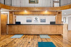a lobby with a waiting area with yoga mats at Quality Inn Evanston near Wyoming Downs in Evanston