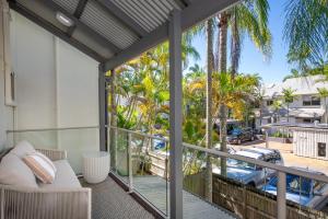 a view from the balcony of a house at Riverside Retreat, Noosaville in Noosaville