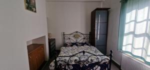 a bedroom with a bed and a window at Rear Borough Suite in Ipswich