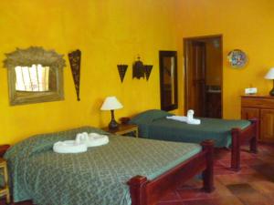 Cama o camas de una habitación en Hotel La Palapa Eco Lodge Resort