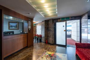 an entrance to a building with a door open at Yeongdeungpo Hotel Jago in Seoul +2 photos