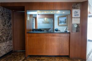an entrance to an information desk in a building at Yeongdeungpo Hotel Jago in Seoul