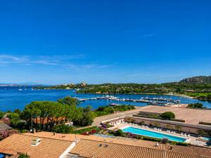 an aerial view of a resort with a marina at Baja Sardinia Sea View And Pool B in Baja Sardinia