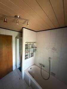 a bathroom with a bath tub in a room at Haus Franz in Zandt +8 photos