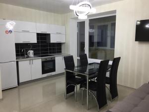 Kuchyňa alebo kuchynka v ubytovaní Most City Area De-Lux Apartment