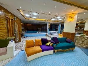 a large living room with a couch at Kite Residence - Secure Stay in Kabul +5 photos