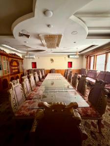 a large conference room with a long table and chairs at Kite Residence - Secure Stay in Kabul