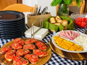 a table with plates of food on a table at Stagnone Area Zero in Birgi Vecchi